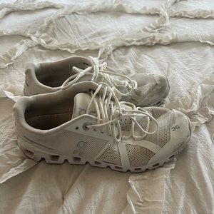 All white On cloud tennis shoes